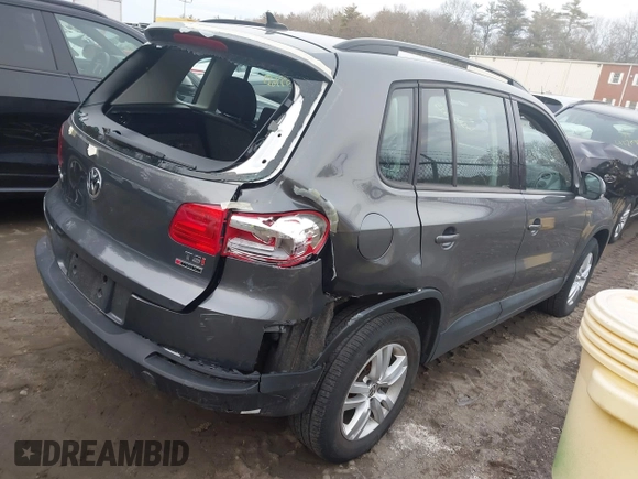 2017 Volkswagen Tiguan S with VIN WVGBV7AX5HK028788, listed as a IAAI auction lot 41699615 with 113,608 mi miles and . Bid and sale history available at DreamBid. Image 4.