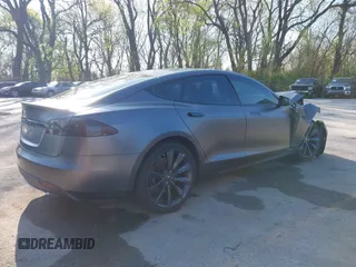 2016 Tesla Model S 90D with VIN 5YJSA1E43GF115310, listed as a IAAI auction lot 42002240 with 108,172 mi miles and . Bid and sale history available at DreamBid. Image 4.