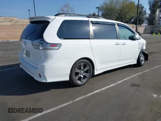 2015 Toyota Sienna SE with VIN 5TDXK3DC6FS627578, listed as a IAAI auction lot 41568684 with 124,138 mi miles and . Bid and sale history available at DreamBid. Image 4.