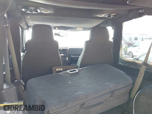 2004 Jeep Wrangler Rubicon with VIN 1J4FA69S64P789308, listed as a IAAI auction lot 41714489 with 186,302 mi miles. Bid and sale history available at carsss.com. Image 8.