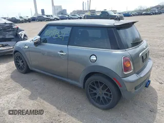 2007 MINI Hardtop S with VIN WMWMF73567TT82315, listed as a IAAI auction lot 42081321 with 123,072 mi miles and . Bid and sale history available at DreamBid. Image 3.
