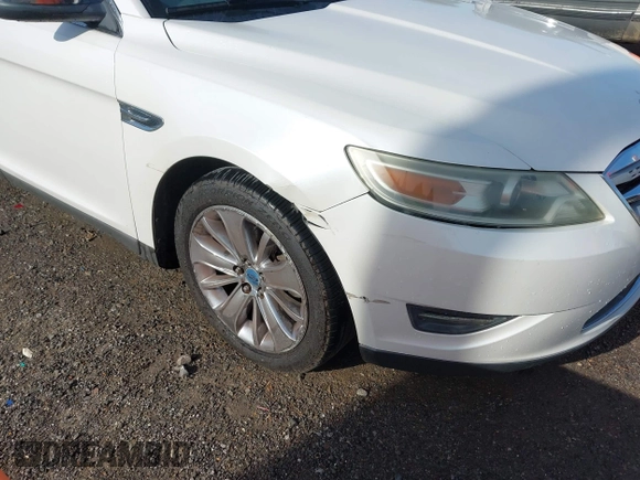 2010 Ford Taurus Limited with VIN 1FAHP2FWXAG112342, listed as a IAAI auction lot 42005142 with 148,947 mi miles. Bid and sale history available at carsss.com. Image 12.