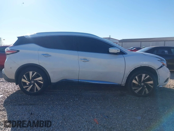 2015 Nissan Murano Platinum z VIN 5N1AZ2MG7FN265552, wystawiony jako IAAI lot #41828490 z przebiegiem 211 465 mil mil oraz . Historia ofert i sprzedaży dostępna na DreamBid. Obrazek 13.