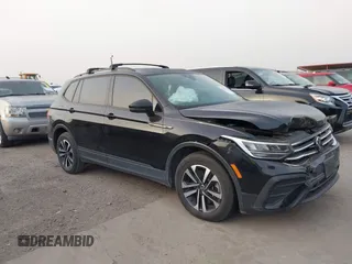 2023 Volkswagen Tiguan S z VIN 3VVRB7AX7PM036833, wystawiony jako IAAI lot #41827631 z przebiegiem 43 383 mil mil oraz . Historia ofert i sprzedaży dostępna na DreamBid. Obrazek 13.