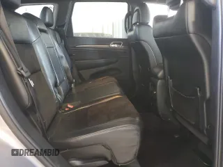 2017 Jeep Grand Cherokee Altitude with VIN 1C4RJFAG9HC772705, listed as a Copart auction lot 61562925 with 184,004 mi miles and Salvage title. Bid and sale history available at DreamBid. Image 11.