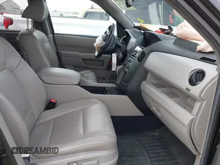 2014 Honda Pilot EX-L with VIN 5FNYF4H5XEB011816, listed as a IAAI auction lot 42165791 with 118,366 mi miles and . Bid and sale history available at carsss.com. Image 5.