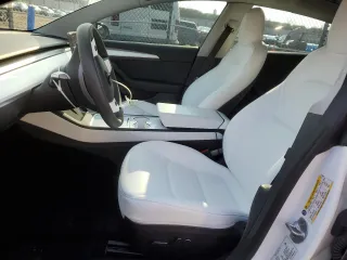 2022 Tesla Model 3 Long Range with VIN 5YJ3E1EBXNF272496, listed as a Copart auction lot 43973435 with 28,450 mi miles and Salvage Title. Bid and sale history available at DreamBid. Image 7.