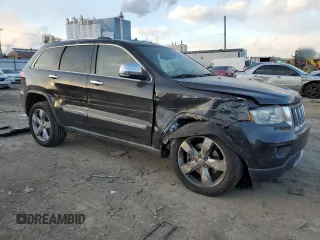 2011 Jeep Grand Cherokee Overland with VIN 1J4RR6GT8BC517168, listed as a Copart auction lot 88652055 with 175,431 mi miles and Salvage title. Bid and sale history available at DreamBid. Image 4.
