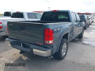 2012 GMC Sierra 1500 SLE with VIN 3GTP2VE71CG260466, listed as a IAAI auction lot 42142836 with 166,823 mi miles and . Bid and sale history available at DreamBid. Image 4.