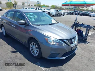 2019 Nissan Sentra SV z VIN 3N1AB7AP6KL612618, wystawiony jako IAAI lot #42218303 z przebiegiem 66 279 mil mil oraz . Historia ofert i sprzedaży dostępna na DreamBid. Obrazek 1.