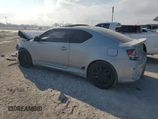 2014 Scion tC with VIN JTKJF5C7XE3068331, listed as a Copart auction lot 44684715 with 141,621 mi miles and Salvage Title. Bid and sale history available at carsss.com. Image 2.