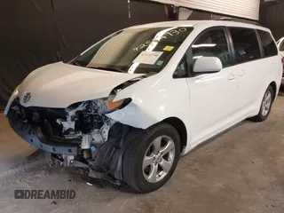 2014 Toyota Sienna LE AAS with VIN 5TDKK3DCXES499628, listed as a IAAI auction lot 42574730 with 110,532 mi miles and . Bid and sale history available at DreamBid. Image 2.