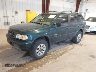 2000 Honda Passport LX z VIN 4S6DM58W1Y4406601, wystawiony jako IAAI lot #41632864 z przebiegiem 195 791 mil mil oraz . Historia ofert i sprzedaży dostępna na DreamBid. Obrazek 2.