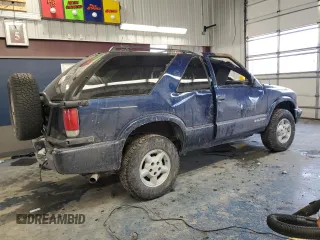 2000 Chevrolet Blazer LS z VIN 1GNCT18WXYK132399, wystawiony jako Copart lot #87880555 z przebiegiem 89 350 mil mil oraz Czysty tytuł • Clean title. Historia ofert i sprzedaży dostępna na DreamBid. Obrazek 3.