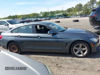 2015 BMW 4 Series 428i xDrive with VIN WBA4C9C55FD331921, listed as a IAAI auction lot 42214901 with 94,970 mi miles and . Bid and sale history available at DreamBid. Image 14.