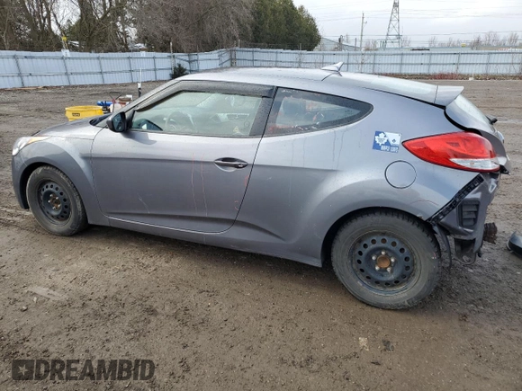 2012 Hyundai Veloster w/Black Int z VIN KMHTC6ADXCU025876, wystawiony jako Copart lot #50377835 z przebiegiem 185 181 mil mil oraz Czysty tytuł • Clean title. Historia ofert i sprzedaży dostępna na DreamBid. Obrazek 2.