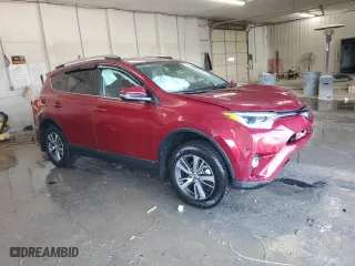 2018 Toyota RAV4 XLE with VIN 2T3WFREV5JW495584, listed as a Copart auction lot 48867725 with 34,060 mi miles and Salvage Title. Bid and sale history available at carsss.com. Image 4.