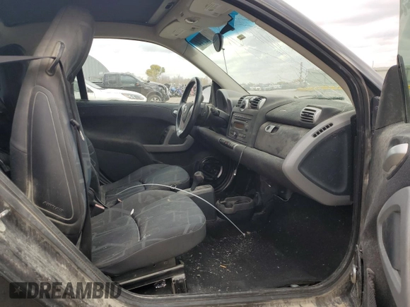 2009 Smart fortwo Pure with VIN WMEEJ31X19K267800, listed as a Copart auction lot 77392744 with 100,178 mi miles and Salvage Title. Bid and sale history available at carsss.com. Image 10.