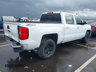 2018 Chevrolet Silverado 1500 LT with VIN 3GCUKREC5JG595959, listed as a IAAI auction lot 41608507 with 117,824 mi miles. Bid and sale history available at carsss.com. Image 4.
