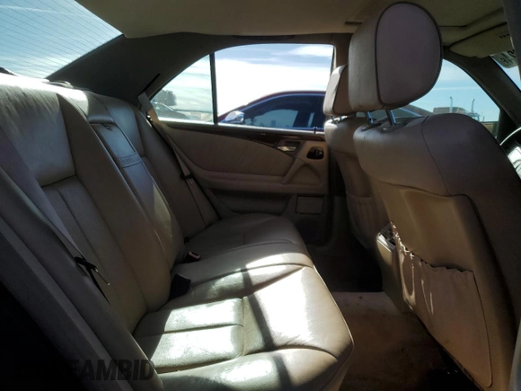 1997 Mercedes-Benz E-Class with VIN WDBJF72F7VA518538, listed as a Copart auction lot 83118824 with 167,288 mi miles and Salvage Title. Bid and sale history available at carsss.com. Image 10.