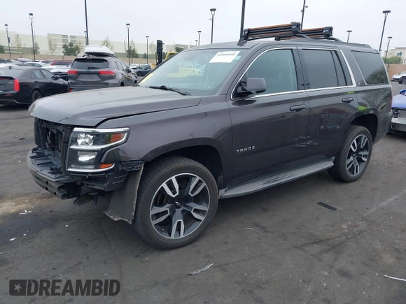 2015 Chevrolet Tahoe LT with VIN 1GNSCBKC1FR233898, listed as a IAAI auction lot 42004048 with 115,779 mi miles and . Bid and sale history available at DreamBid. Image 2.