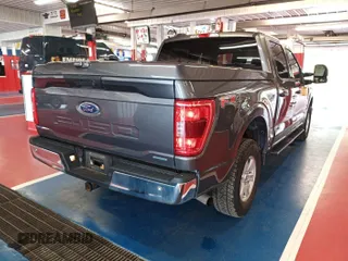 2021 Ford F-150 XL with VIN 1FTFW1E81MKE96112, listed as a IAAI auction lot 42788387 with 101,494 mi miles and . Bid and sale history available at DreamBid. Image 23.