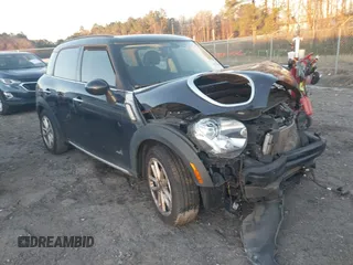 2015 MINI Countryman S z VIN WMWZC5C50FWP48575, wystawiony jako IAAI lot #41218441 z przebiegiem 113 947 mil mil oraz . Historia ofert i sprzedaży dostępna na DreamBid. Obrazek 1.
