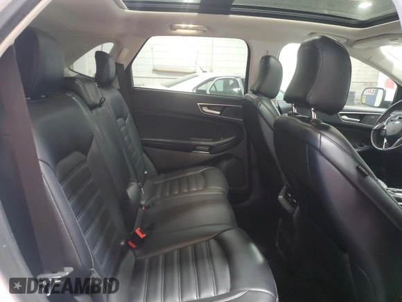 2023 Ford Edge SEL z VIN 2FMPK4J94PBA22570, wystawiony jako Copart lot #56350435 z przebiegiem 27 761 mil mil oraz Szkoda całkowita • Salvage title. Historia ofert i sprzedaży dostępna na DreamBid. Obrazek 11.