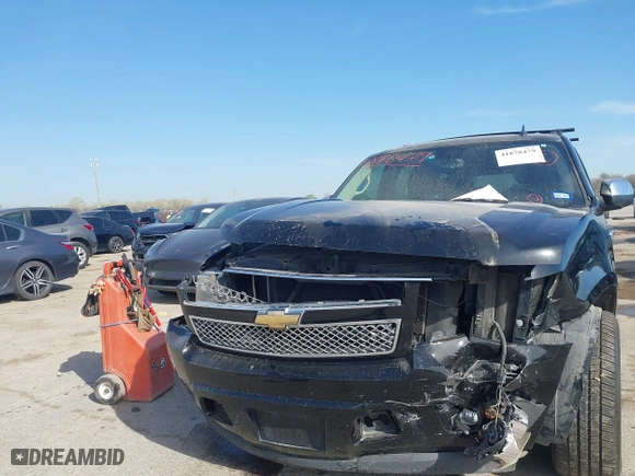 2011 Chevrolet Suburban LTZ with VIN 1GNSCKE03BR117338, listed as a IAAI auction lot 41878479 with 182,327 mi miles. Bid and sale history available at carsss.com. Image 6.