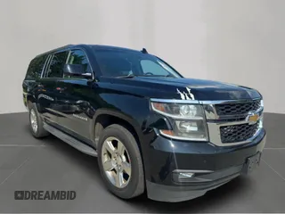 2016 Chevrolet Suburban LT with VIN 1GNSKHKC0GR14614, listed as a Copart auction lot 65295535 with 215,675 mi miles and Clean title. Bid and sale history available at DreamBid. Image 2.