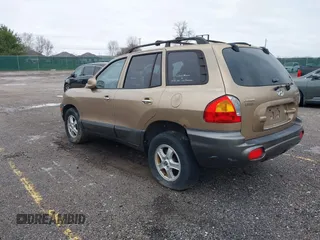 2004 Hyundai Santa Fe GLS with VIN KM8SC13E74U685895, listed as a IAAI auction lot 41813226 with 195,217 mi miles. Bid and sale history available at carsss.com. Image 3.