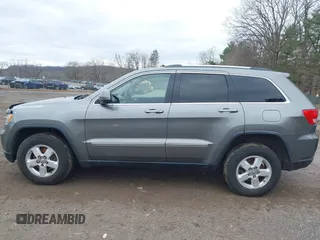 2012 Jeep Grand Cherokee Laredo with VIN 1C4RJFAG0CC270545, listed as a IAAI auction lot 41940781 with 200,529 mi miles. Bid and sale history available at carsss.com. Image 14.