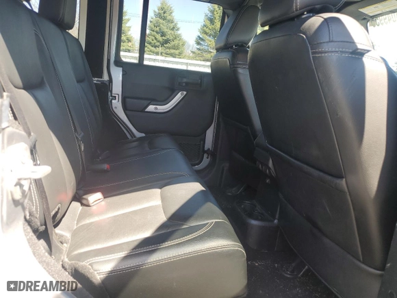2015 Jeep Wrangler Unlimited Rubicon Hard Rock with VIN 1C4HJWFG2FL686556, listed as a Copart auction lot 54049955 with 126,675 mi miles and Salvage Title. Bid and sale history available at carsss.com. Image 11.