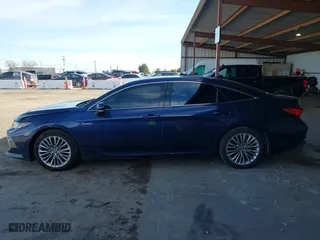 2019 Toyota Avalon Hybrid Limited with VIN 4T1B21FB5KU007633, listed as a IAAI auction lot 41615161 with 132,182 mi miles. Bid and sale history available at carsss.com. Image 14.