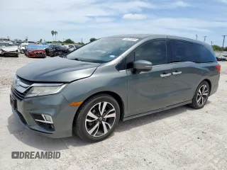 2018 Honda Odyssey Elite with VIN 5FNRL6H92JB104898, listed as a Copart auction lot 65257635 with 147,250 mi miles and Clean title. Bid and sale history available at DreamBid. Image 1.