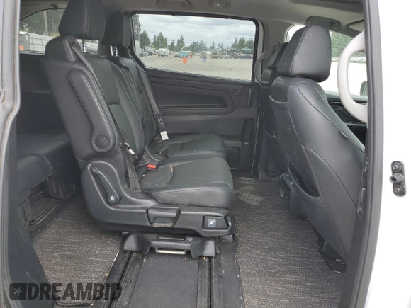 2022 Honda Odyssey Touring with VIN 5FNRL6H8XNB016064, listed as a Copart auction lot 65289595 with 24,946 mi miles and Salvage title. Bid and sale history available at DreamBid. Image 11.