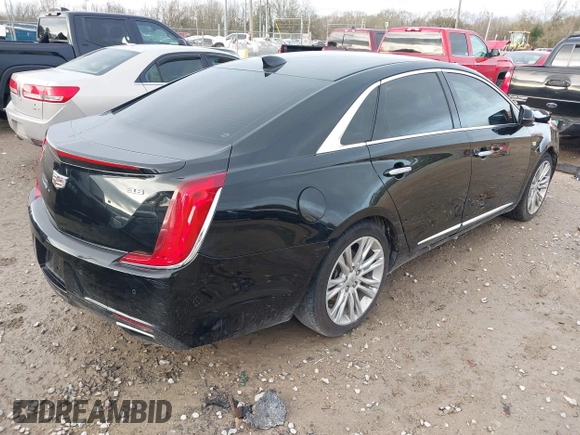2018 Cadillac XTS Luxury with VIN 2G61M5S31J9135706, listed as a IAAI auction lot 41572396 with 140,539 mi miles. Bid and sale history available at carsss.com. Image 4.