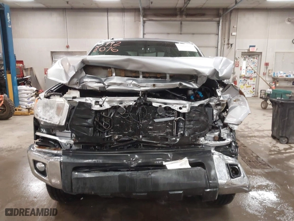 2014 Toyota Tundra 4WD Truck SR with VIN 5TFUY5F17EX357035, listed as a IAAI auction lot 39928076 with 129,831 mi miles. Bid and sale history available at carsss.com. Image 12.