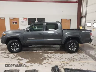 2021 Toyota Tacoma SR z VIN 3TMCZ5AN2MM444249, wystawiony jako IAAI lot #41942146 z przebiegiem 59 429 mil mil oraz . Historia ofert i sprzedaży dostępna na DreamBid. Obrazek 15.