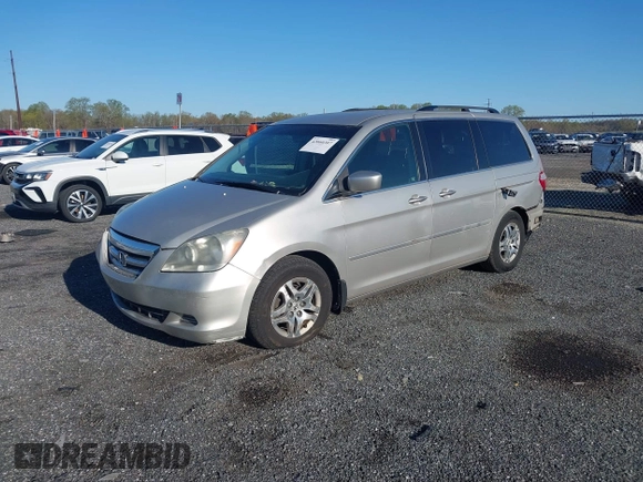 2005 Honda Odyssey EX with VIN 5FNRL38445B411188, listed as a IAAI auction lot 42060307 with 240,688 mi miles. Bid and sale history available at carsss.com. Image 2.