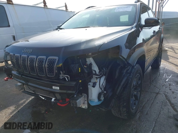 2022 Jeep Cherokee Trailhawk with VIN 1C4PJMBX1ND533715, listed as a IAAI auction lot 42041057 with 65,487 mi miles and . Bid and sale history available at DreamBid. Image 6.