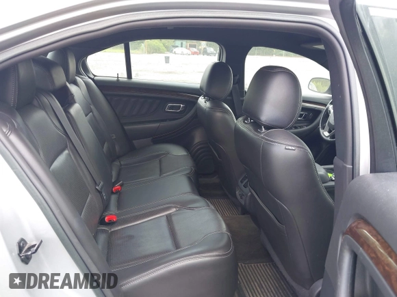 2013 Ford Taurus Limited with VIN 1FAHP2F87DG235392, listed as a IAAI auction lot 42431543 with 123,904 mi miles and . Bid and sale history available at DreamBid. Image 8.