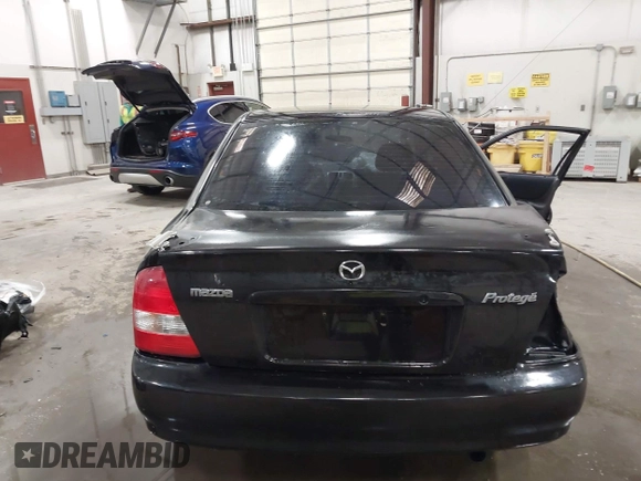2003 Mazda Protege DX with VIN JM1BJ226431112902, listed as a IAAI auction lot 41939907 with 184,618 mi miles and . Bid and sale history available at DreamBid. Image 17.