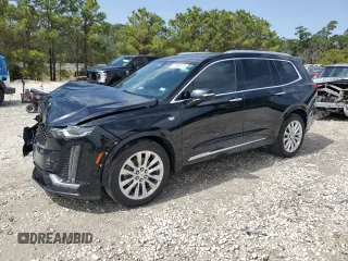 2020 Cadillac XT6 FWD Premium Luxury with VIN 1GYKPCRSXLZ104502, listed as a Copart auction lot 47808125 with 97,053 mi miles and Salvage Title. Bid and sale history available at carsss.com. Image 1.