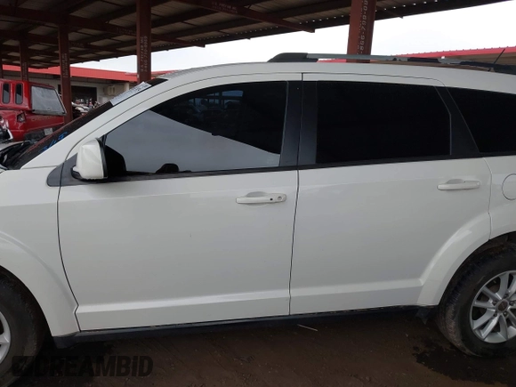 2017 Dodge Journey SXT z VIN 3C4PDDBG2HT595307, wystawiony jako IAAI lot #41813975 z przebiegiem 192 659 mil mil oraz . Historia ofert i sprzedaży dostępna na DreamBid. Obrazek 13.