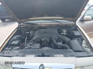 2000 Mercury Grand Marquis LS z VIN 2MEFM75W7YX729323, wystawiony jako IAAI lot #42475457 z przebiegiem 148 910 mil mil oraz . Historia ofert i sprzedaży dostępna na DreamBid. Obrazek 10.