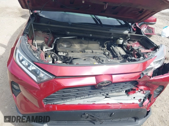2019 Toyota RAV4 XLE with VIN JTMP1RFV2KD021348, listed as a IAAI auction lot 42198925 with 130,838 mi miles and . Bid and sale history available at DreamBid. Image 10.