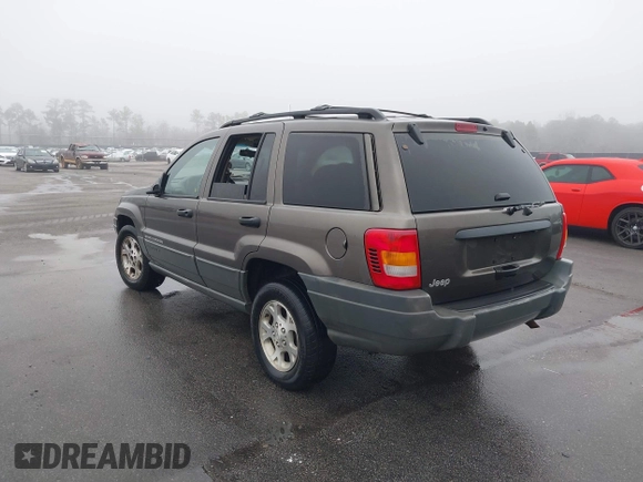 1999 Jeep Grand Cherokee Laredo с VIN 1J4G258S2XC768349, выставлен на аукционе IAAI как лот 41305102 с пробегом 136 848 миль миль и . История ставок и продаж доступна на DreamBid. Изображение 3.