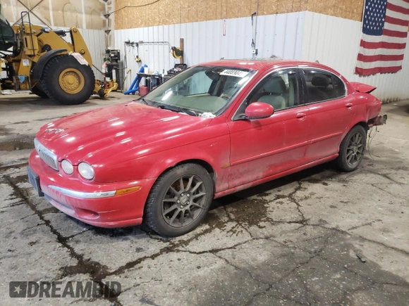 2004 Jaguar X-Type with VIN SAJEA51CX4WE15195, listed as a Copart auction lot 57868405 with 171,698 mi miles and Non Repairable. Bid and sale history available at DreamBid. Image 1.