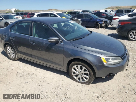 2013 Volkswagen Jetta SE with VIN 3VWDX7AJ3DM271048, listed as a Copart auction lot 59257995 with 122,393 mi miles and Salvage title. Bid and sale history available at DreamBid. Image 4.